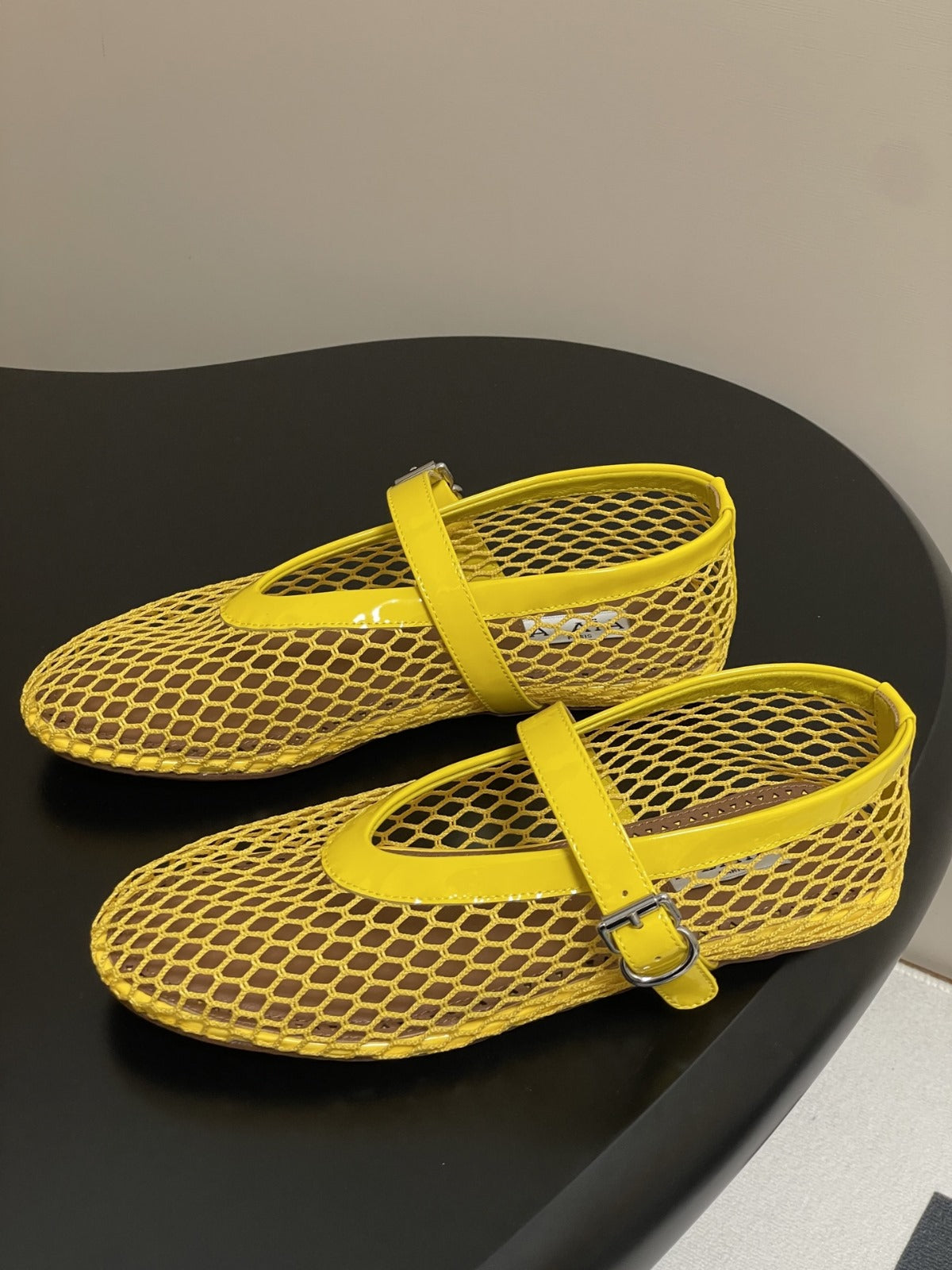 ALAIA BALLET FLATS IN YELLOW MESH FISHNET