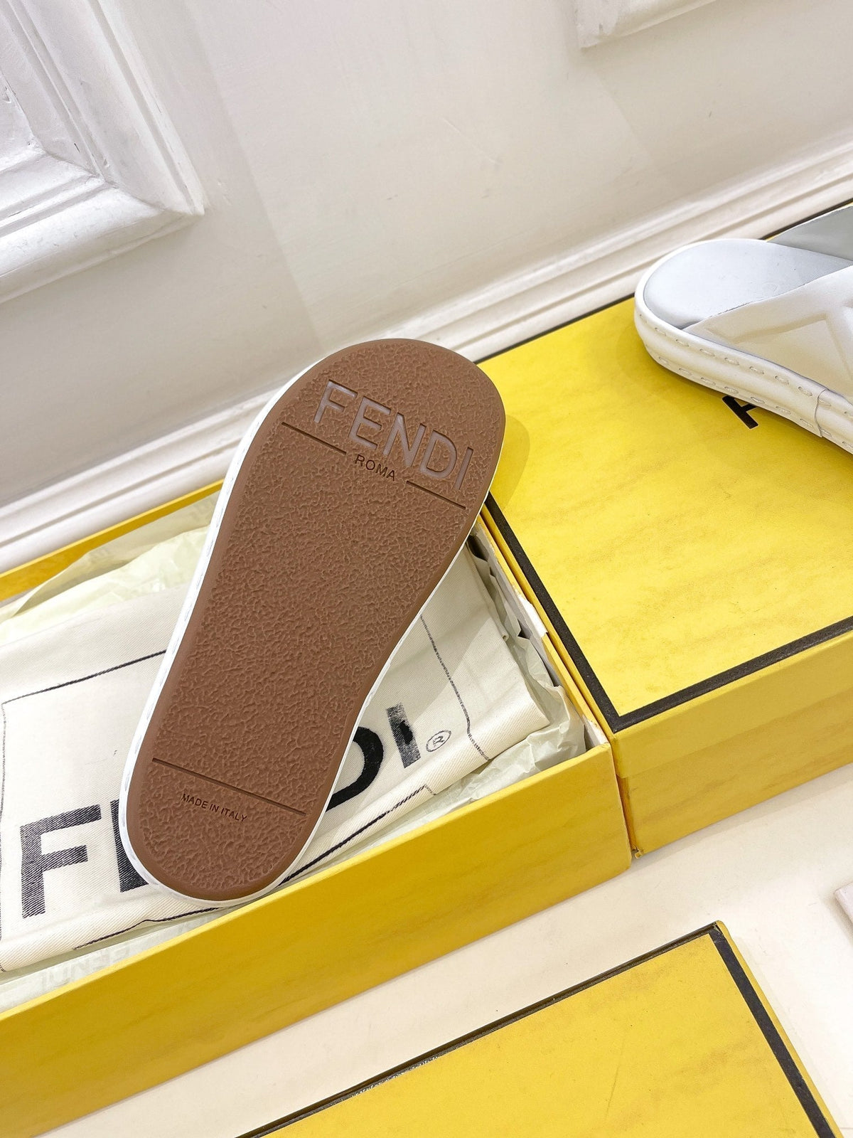 FENDI CROSSOVER SLIPPER IN WHITE CALFSKIN
