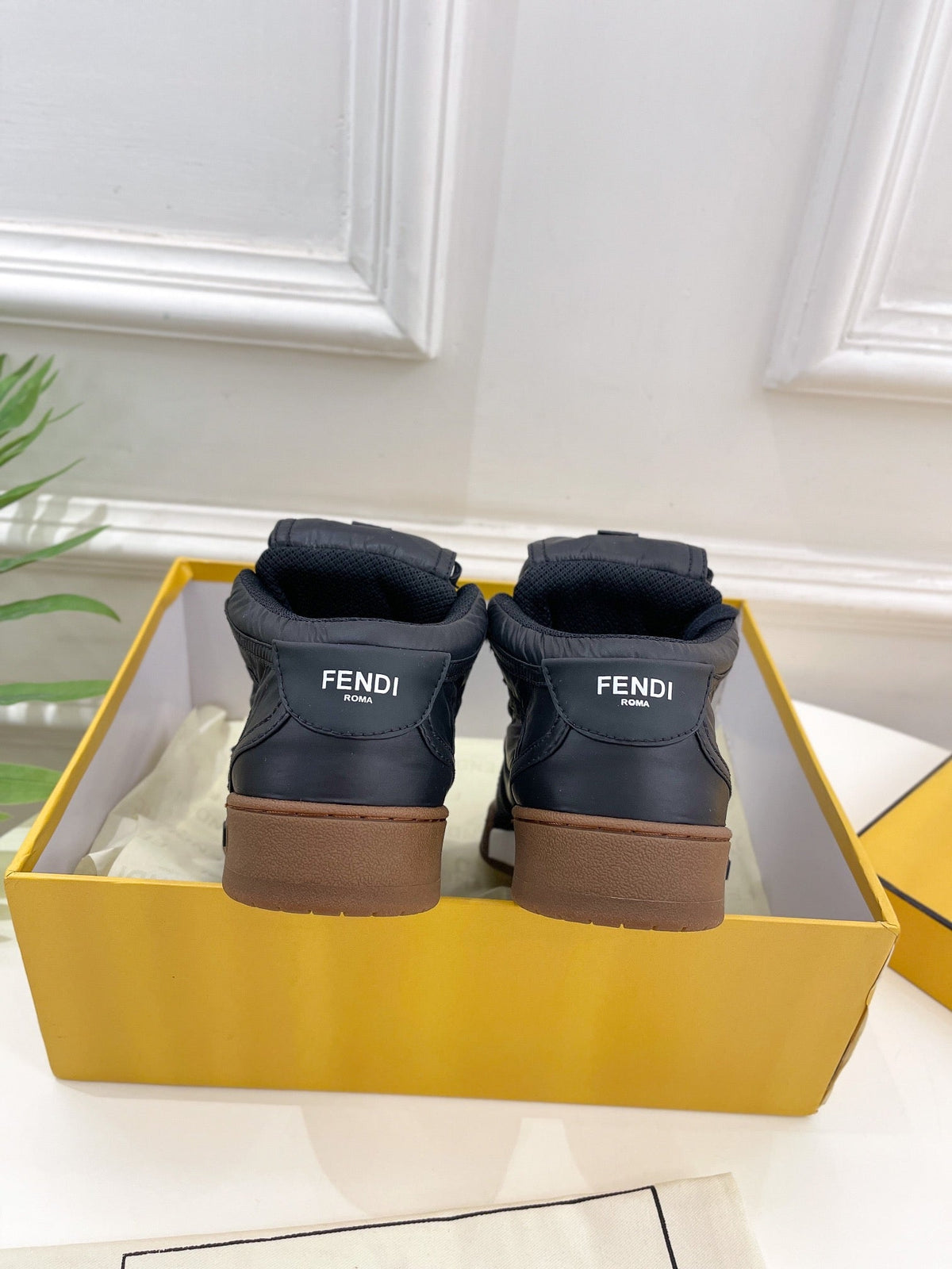 FENDI LOGO SOCK SNEAKER BOOTS IN BLACK LAMBSKIN