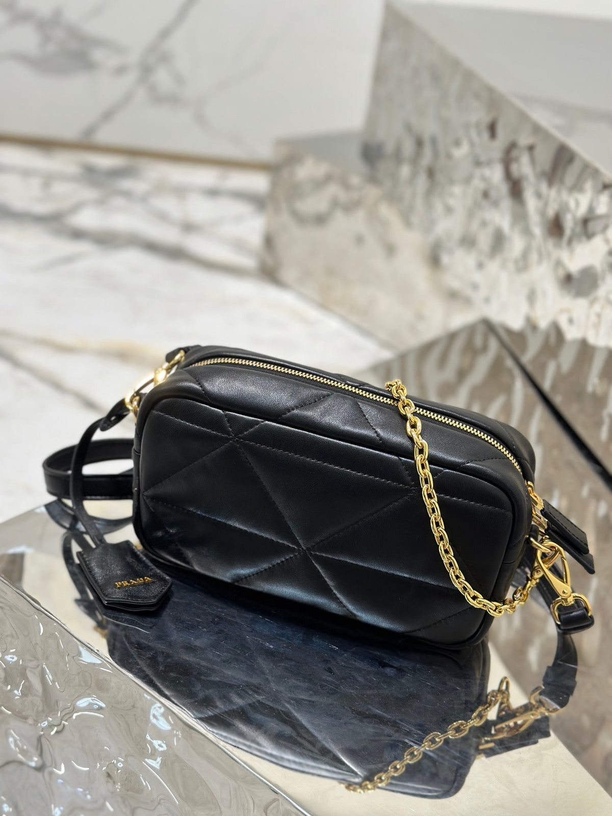 CAMERA BAG 22 IN BLACK TRIANGLE PATTERN QUILTED LAMBSKIN GOLD HARDWARE
