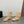 ALAIA SHORT BOOTS IN BEIGE MESH FISHNET