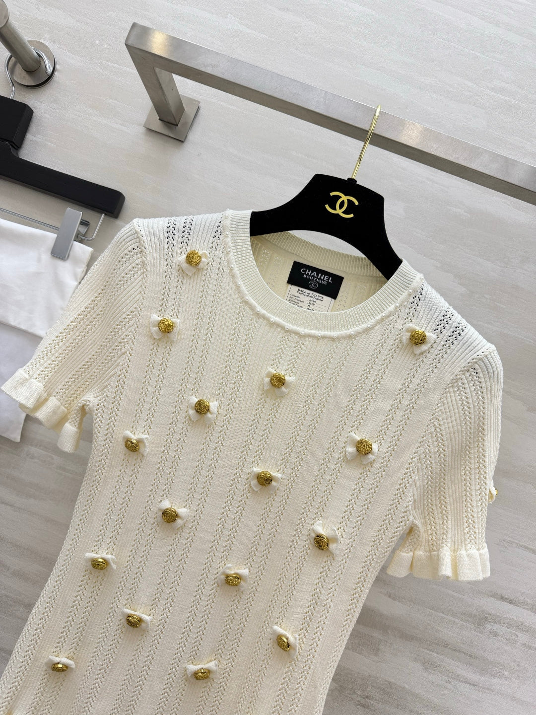 Chanel 2026 Gold Button Bow Short-sleeve Top Cream Cotton 394202