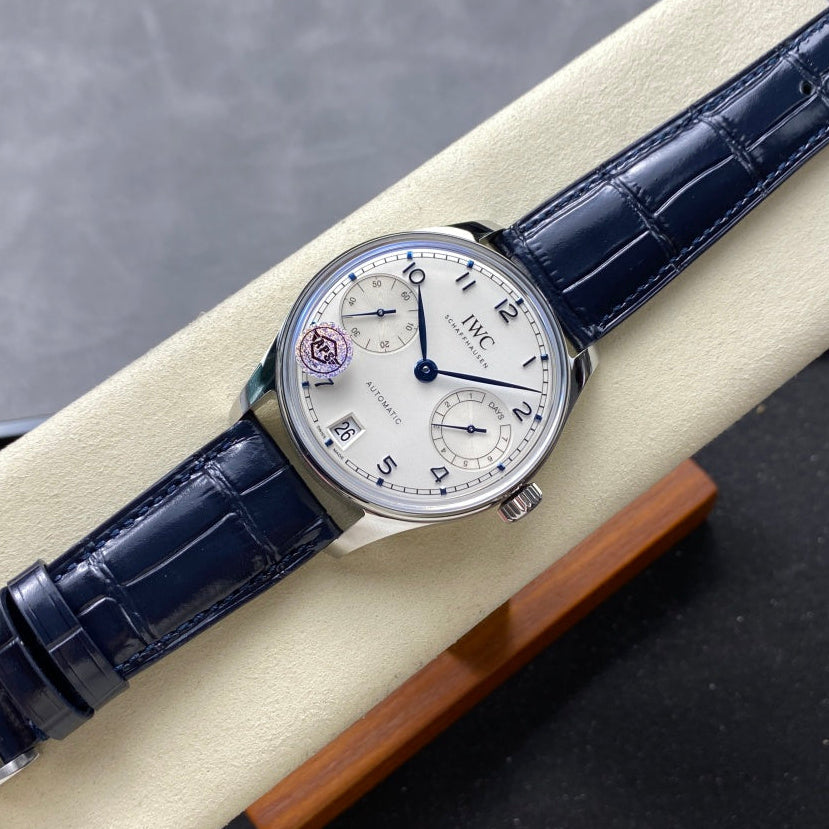 IWC Portuguese 42.4mm Cream Dial Steel Case Navy Blue Leather Strap