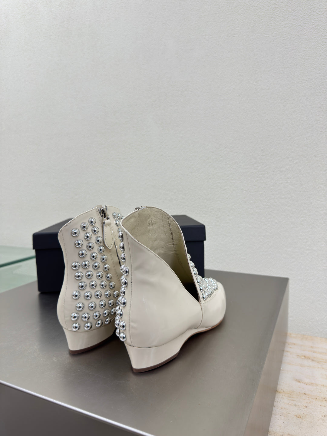 ALAIA Rivet ankle boots ivory cowhide leather 471092