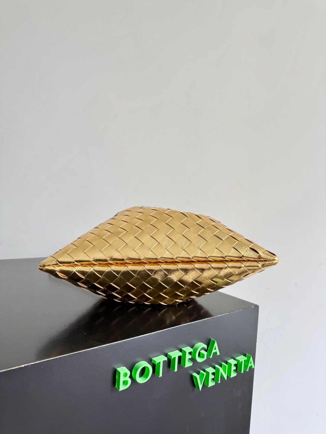 Bottega Veneta 2026 Dust Bag Gold Laminated Leather