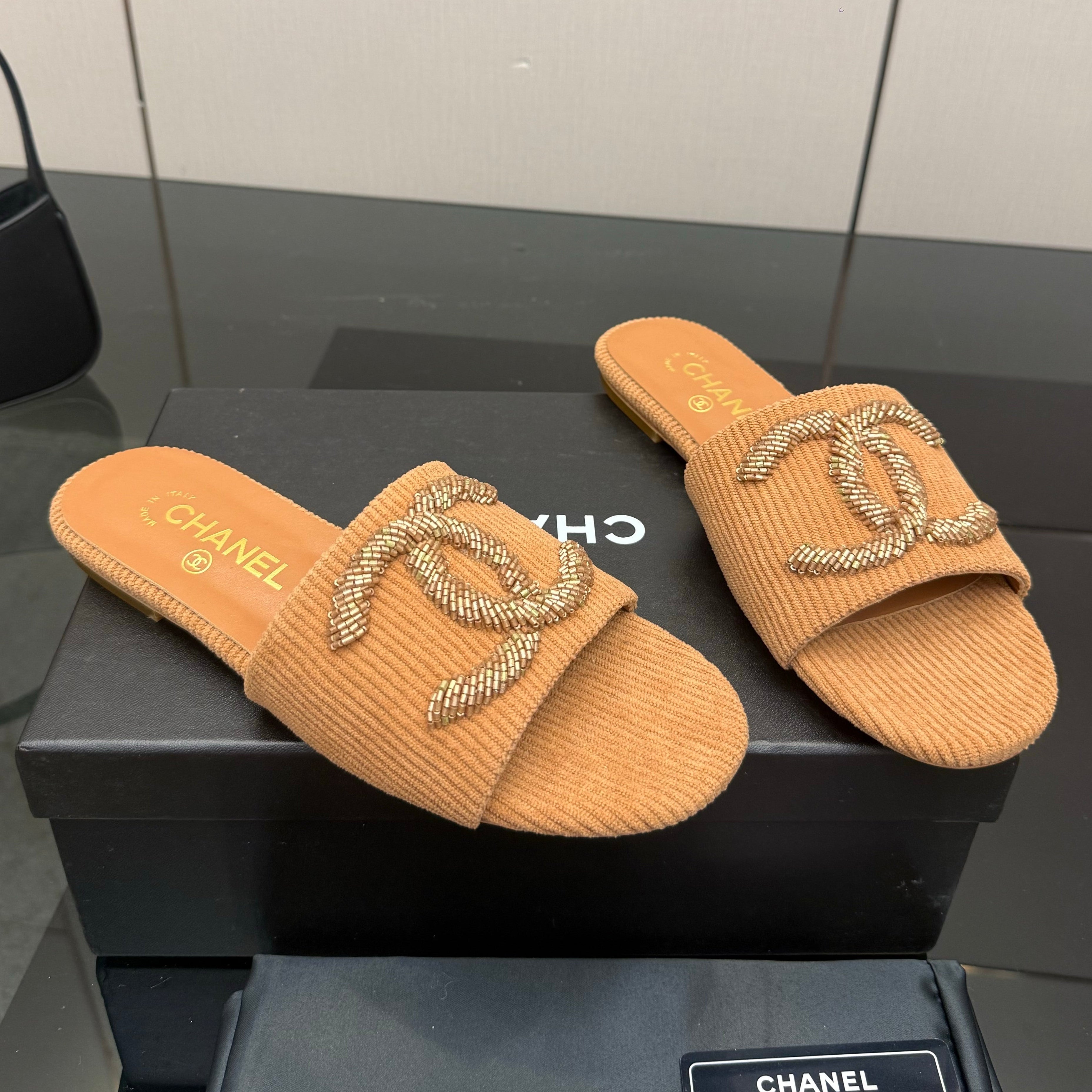 Chanel 2026 Slippers Leather Raffia Large Gold CC Logo 791589