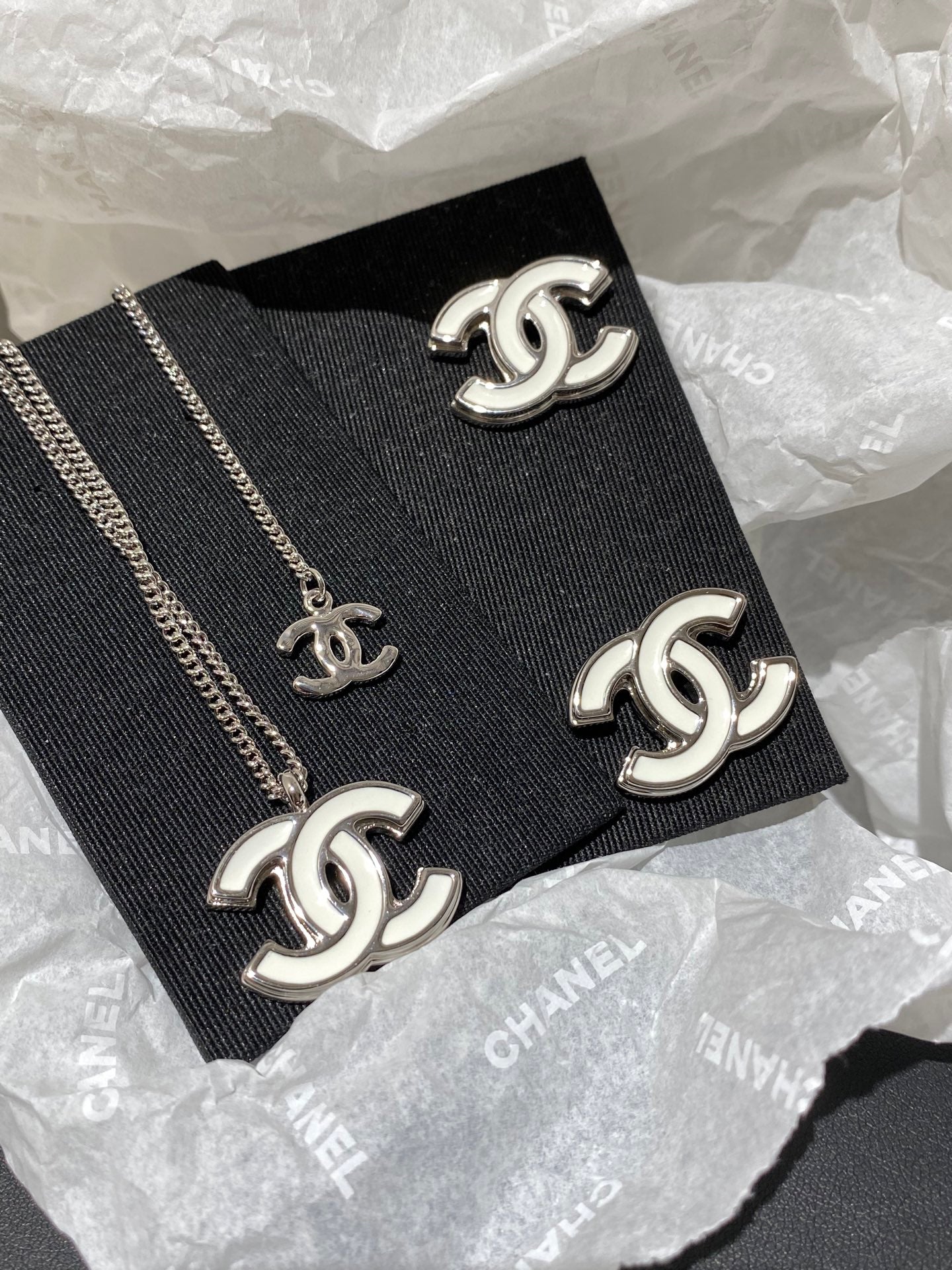 Chanel White Enamel CC Stud Earrings With Silver-tone Trim