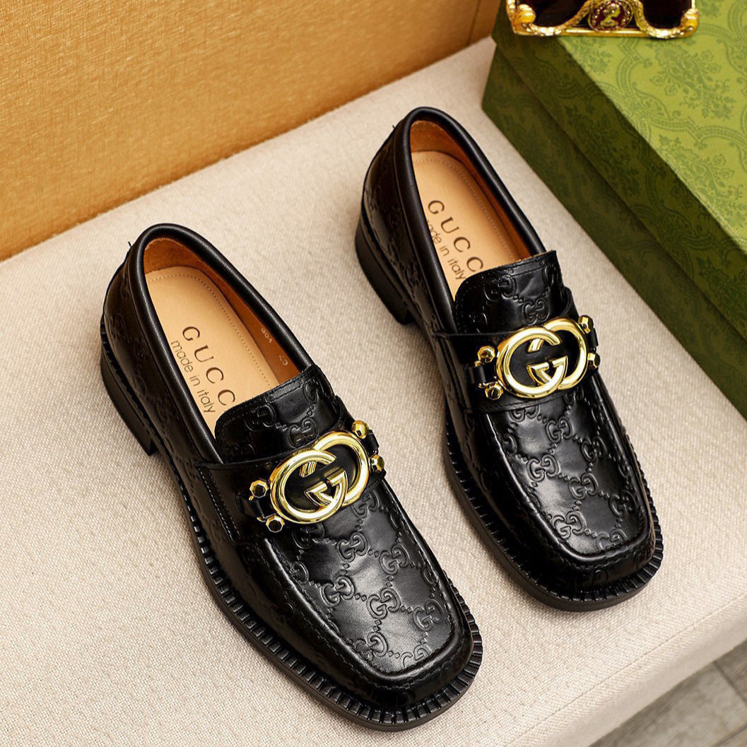 GG Men's Loafer Black GG Gold Embossed Cowhide 736976