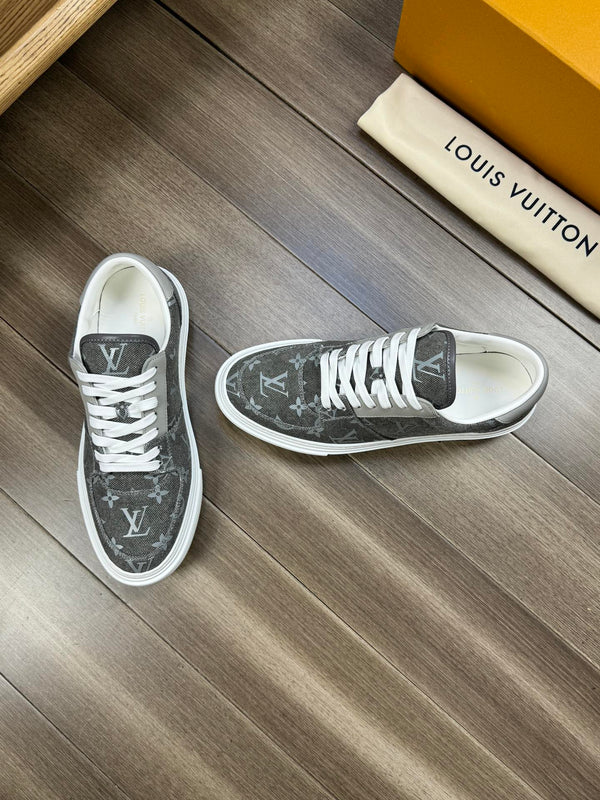 LV TRAINER SNEAKER IN GREY PASTEL MONOGRAM DENIM