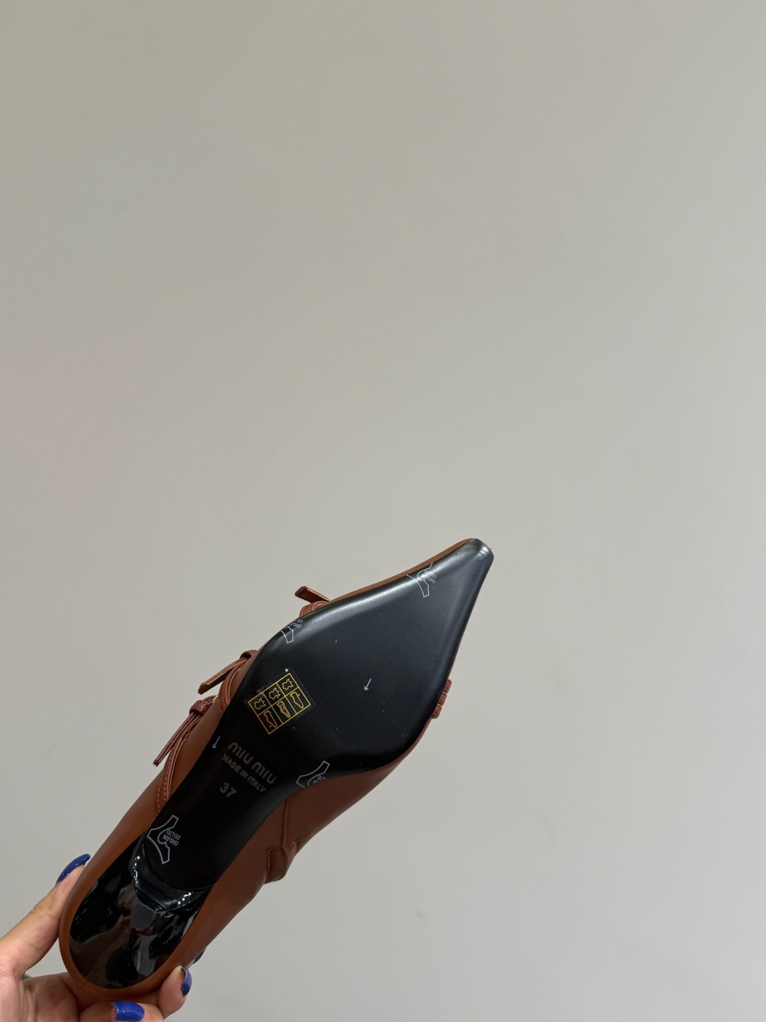 Miu short boots brown cowhide 417981