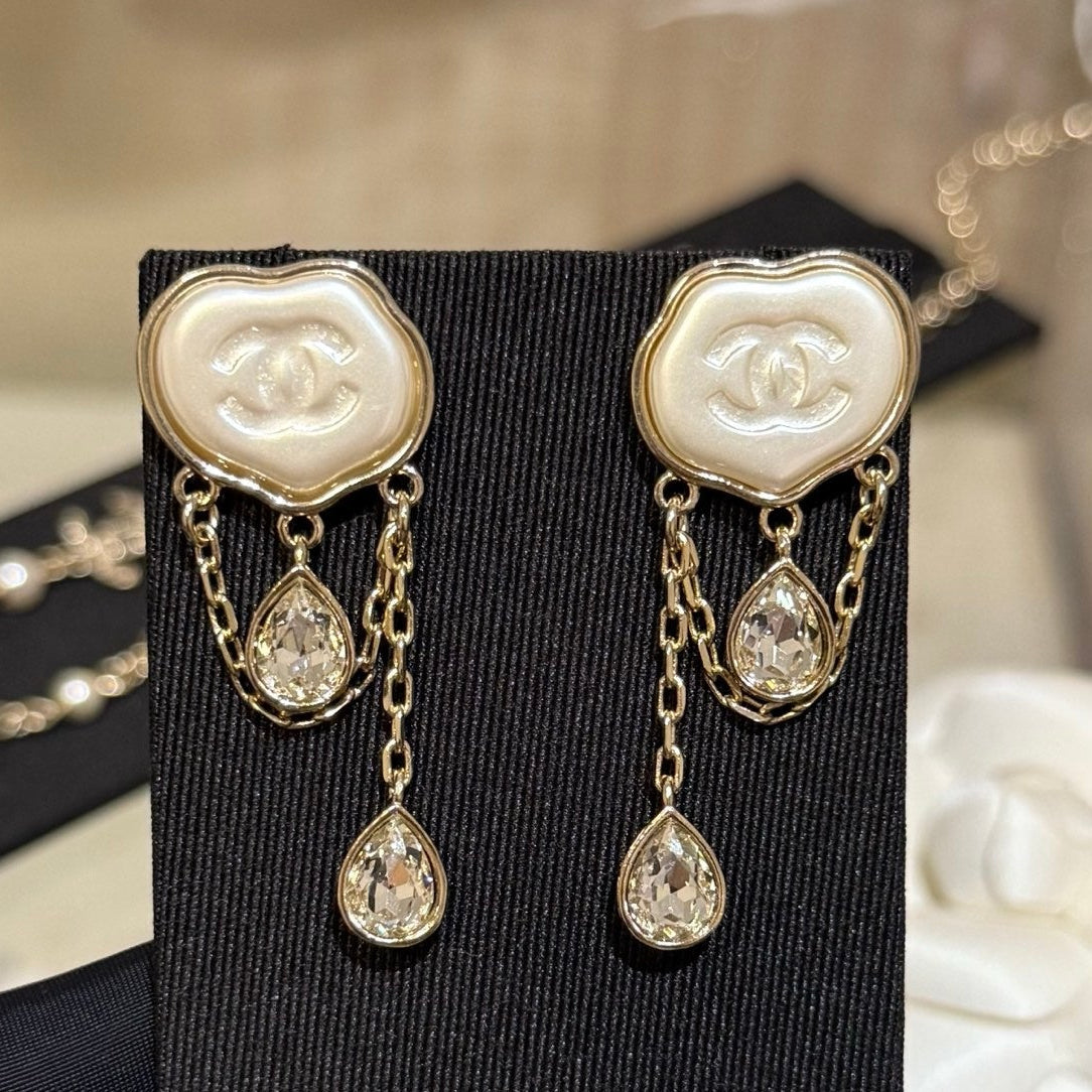 Chanel  Cloud Double C Resin Double Teardrop Crystal Light Gold Chain Tassel Earrings