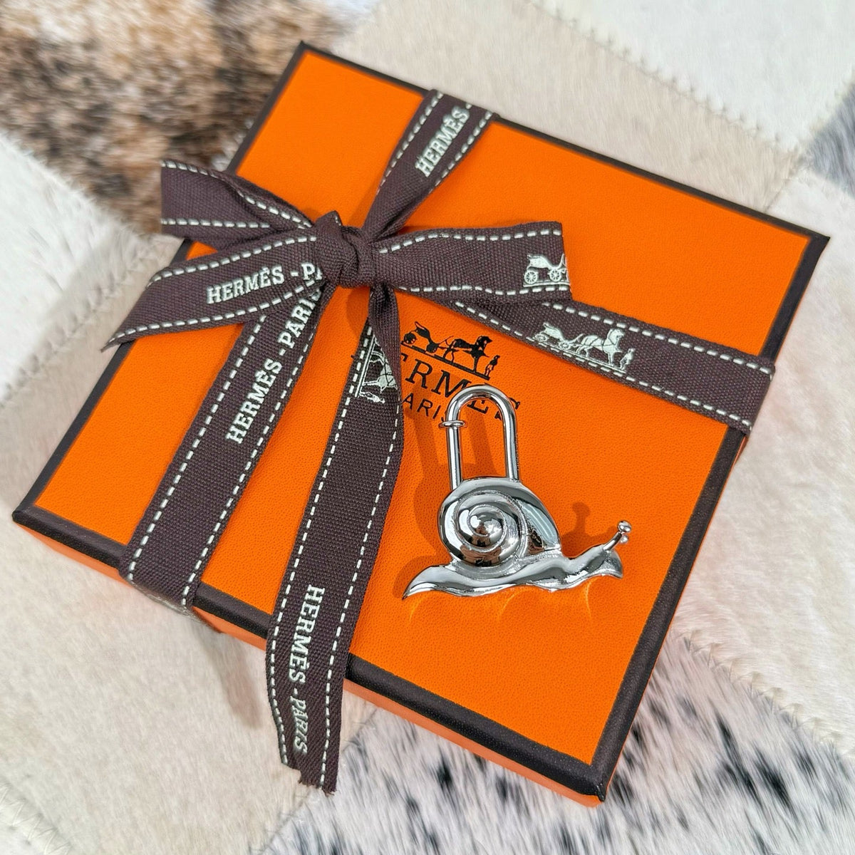 HM Snail Lock Bag Charm