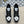 LV TRAINERS IN BLACK CALFSKIN AND WHITE JACQUARD
