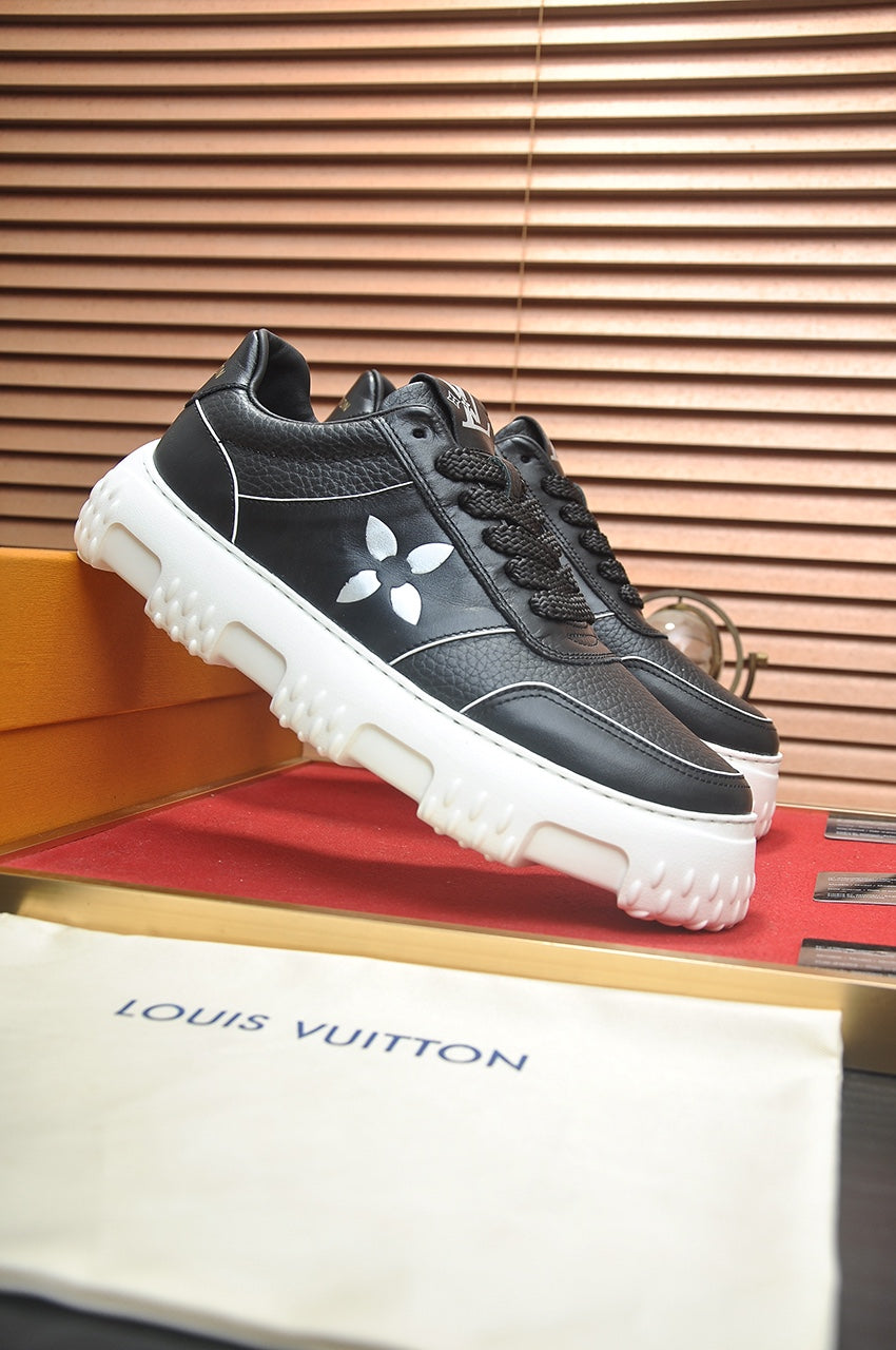 LV TRAINER BLACK MONOGRAM CALFSKIN
