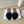 ALAIA FLAT MULE IN BLACK SUEDE
