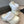 PLATFORM MULES IN BEIGE RUBBER MIX RABBIT FUR SILVER HARDWARE