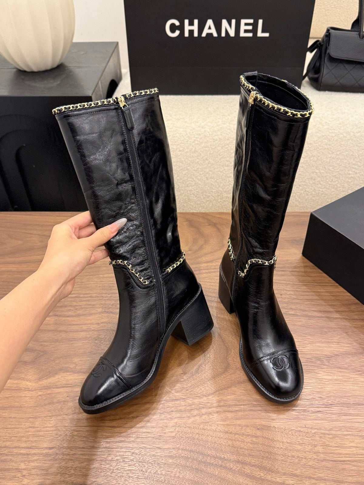 Chanel 2026 Crumped Cap Toe Chain Boots 65mm Leather 173455