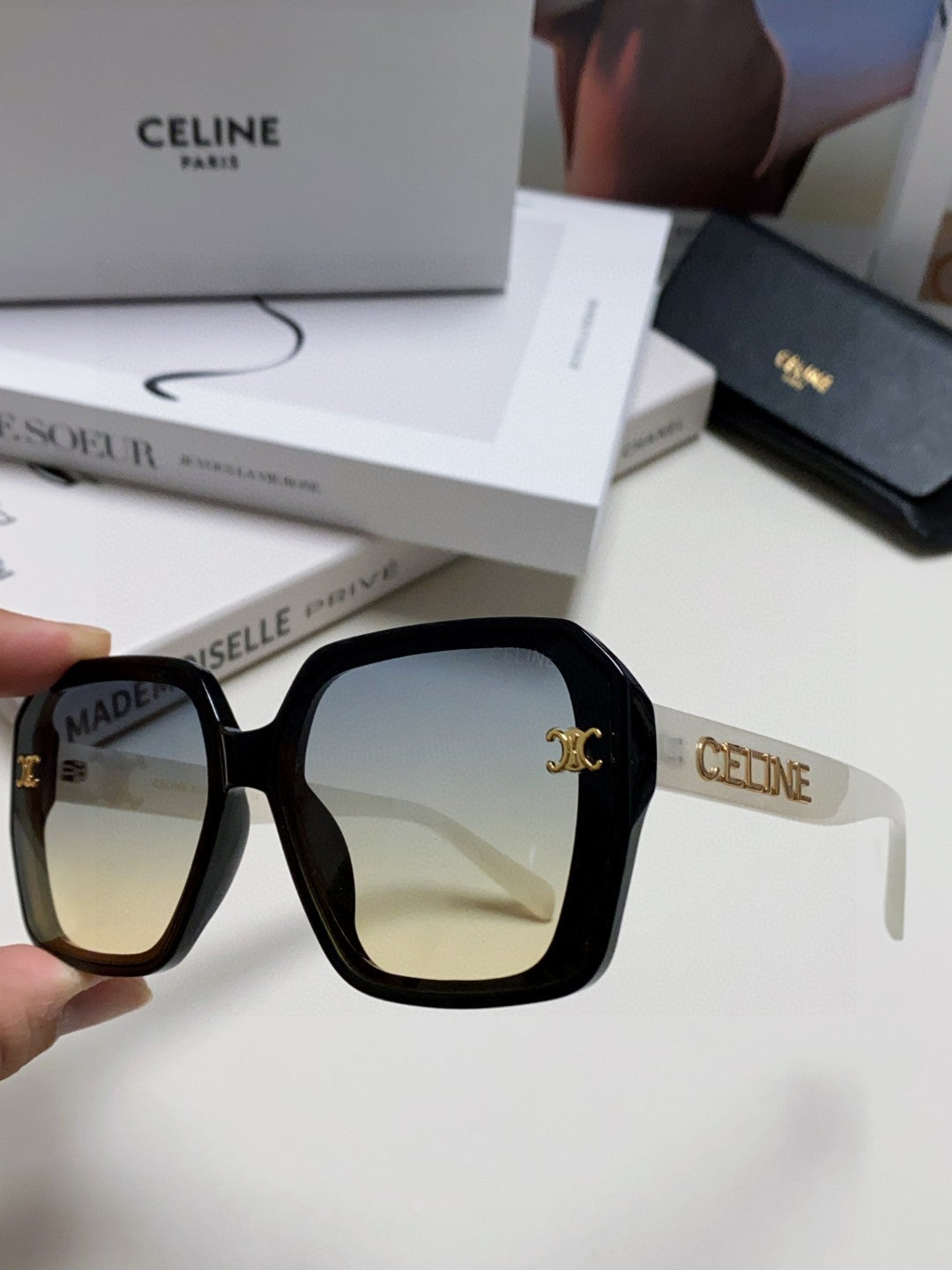 TRIOMPHE SUNGLASSES 548593 IN BLACK AND WHITE ACETATE