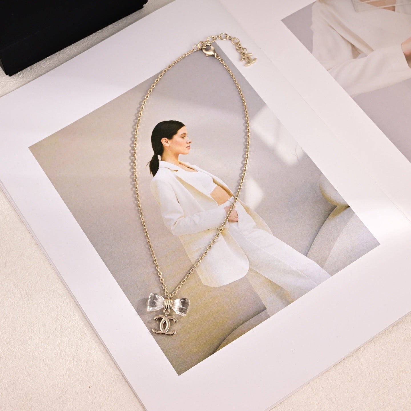 CC Transparent Bow Light Gold Necklaces