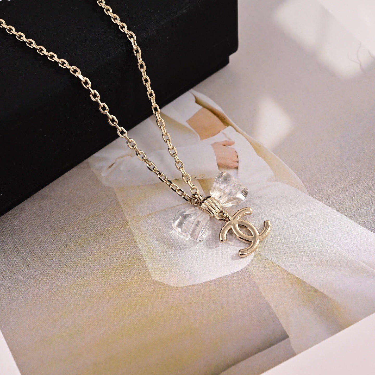 CC Transparent Bow Light Gold Necklaces