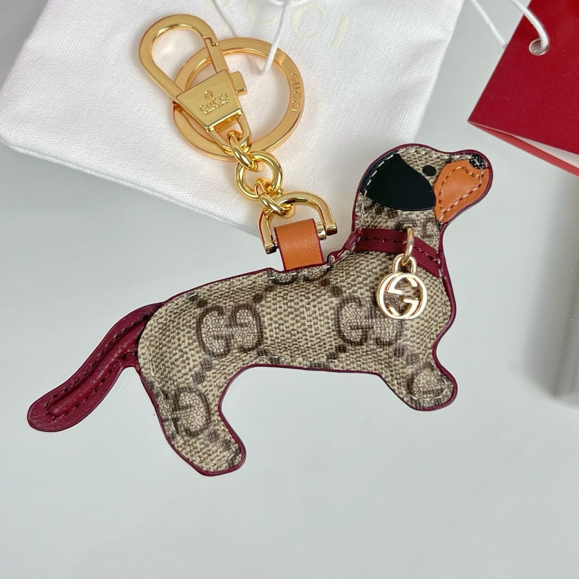 Gucci Dog-shaped Etoupe Gold Bag Charm
