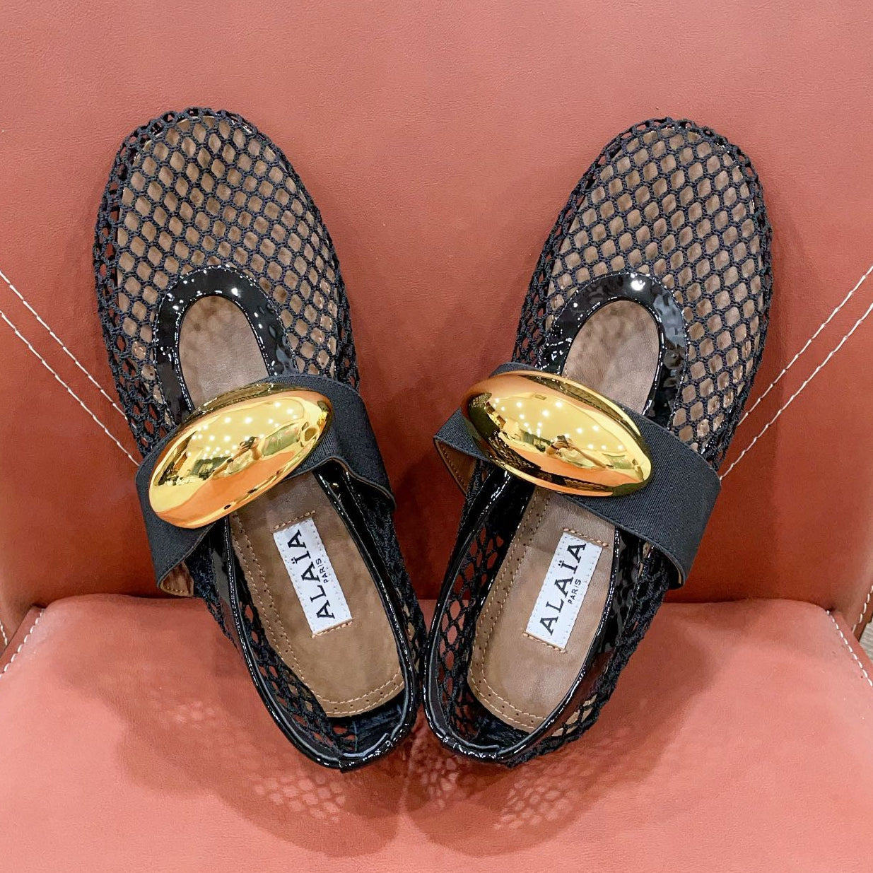 ALAIA MARY JANE SHOES IN BLACK MESH WITH GOLD HARDWARE