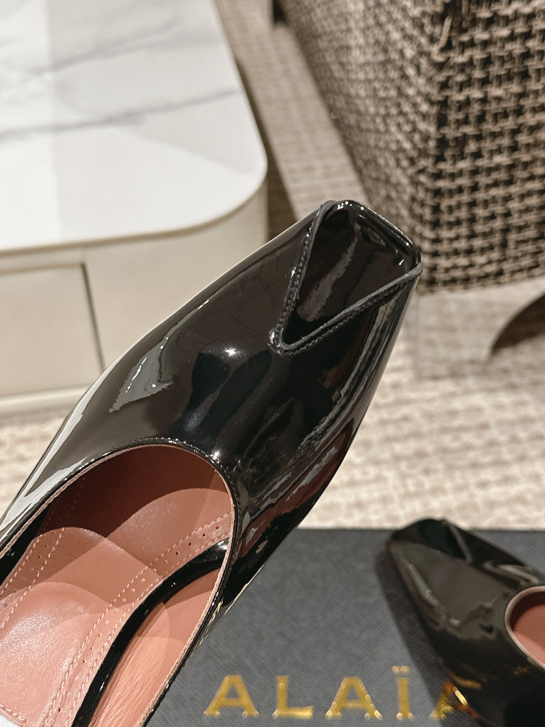 ALAIA SPIKE JEWEL MULES IN BLACK GLOSSY CALFSKIN