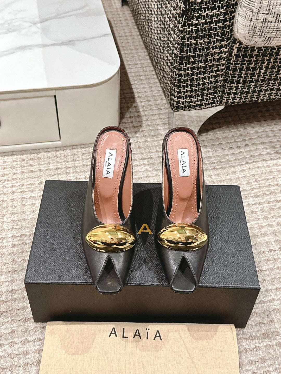 ALAIA SPIKE JEWEL MULES IN BLACK CALFSKIN WITH GOLD HARDWARE