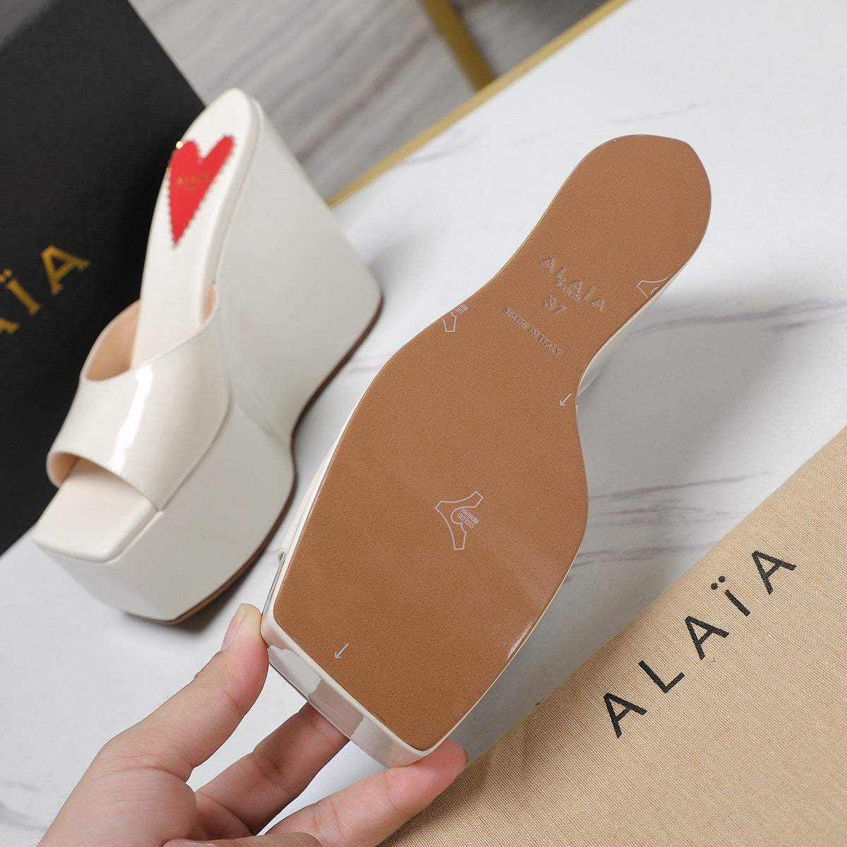 ALAIA PLATFORM WEDGE IN WHITE TAN LAMBSKIN WITH RED HEART