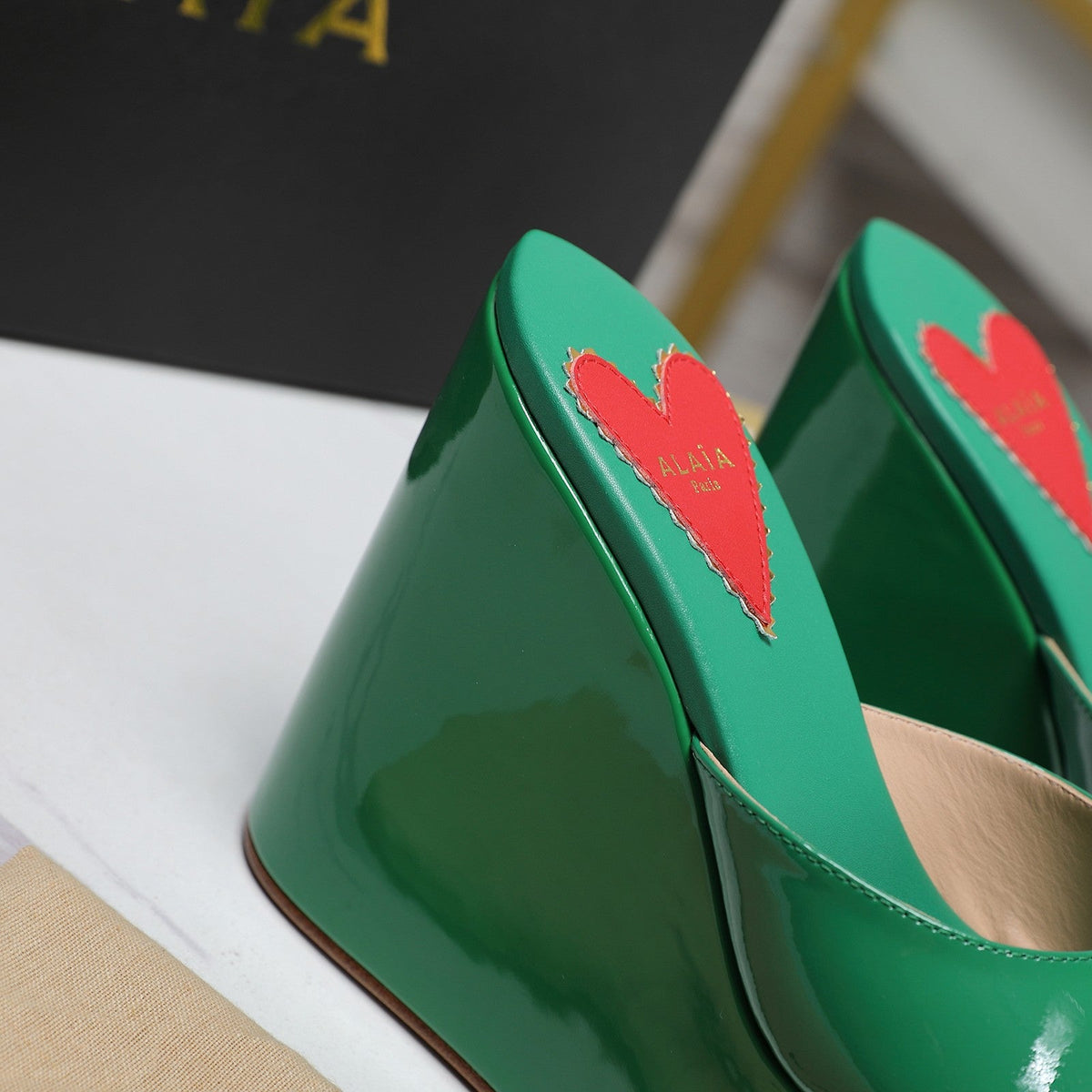ALAIA PLATFORM WEDGE IN COOL GREEN LAMBSKIN WITH RED HEART