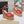 ALAIA WEDGE SANDAL IN CHERRY RED MESH AND BEIGE RUBBER