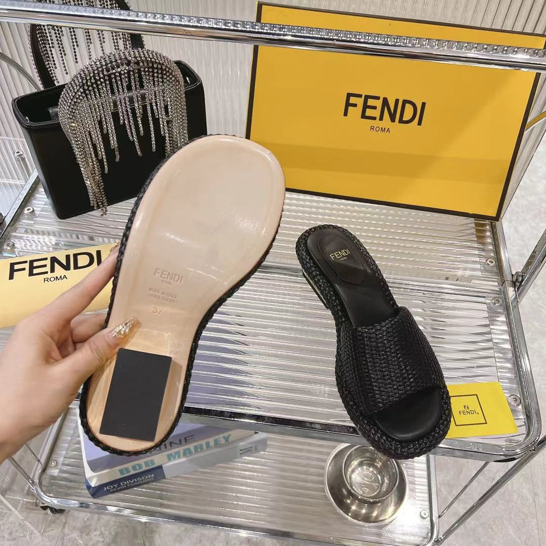 FENDI BAGUETTE SLIDES WOMEN IN BLACK RAFFIA