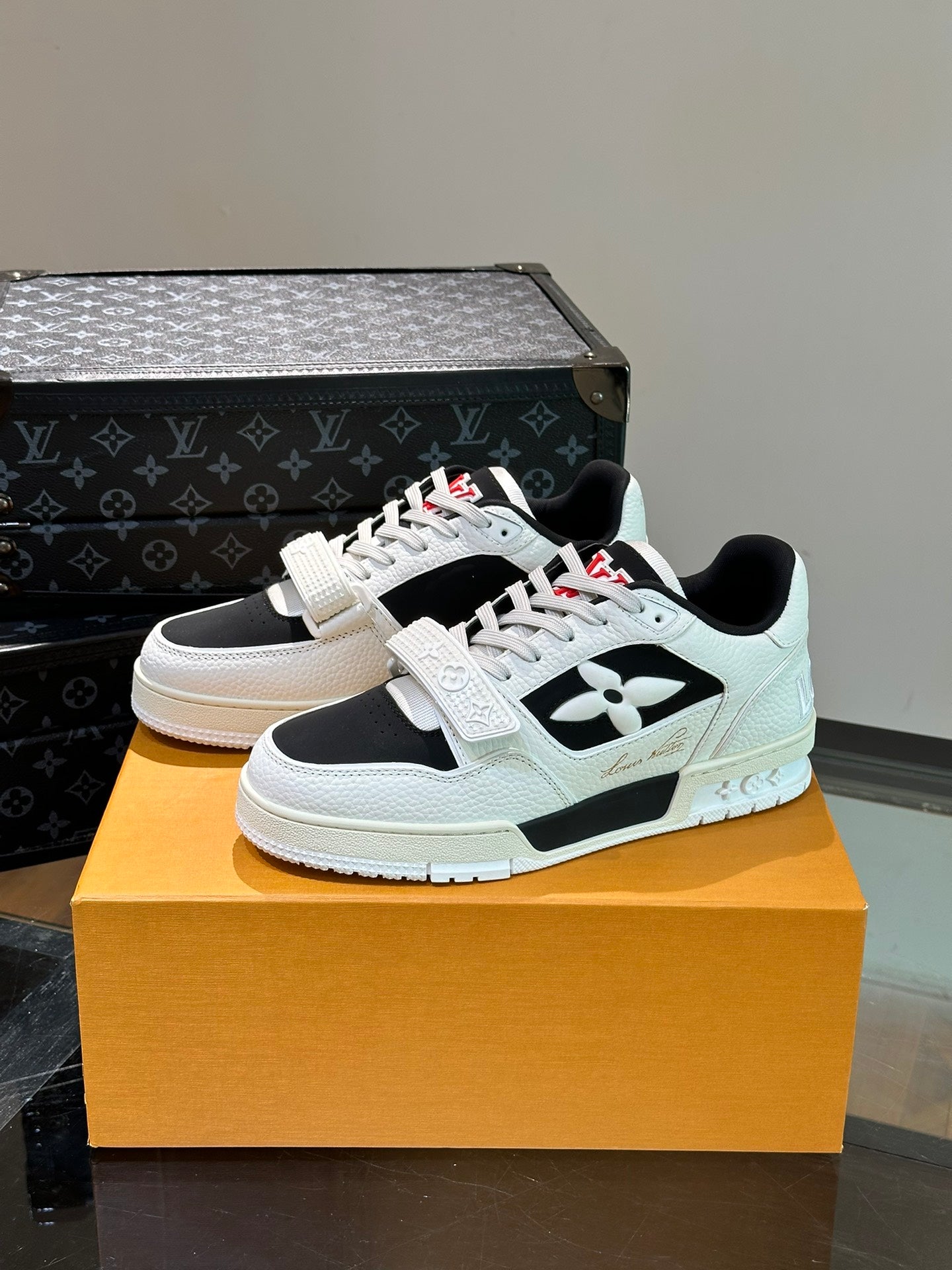 LV TRAINER SNEAKERS IN WHITE CALFSKIN AND BLACK SUEDE